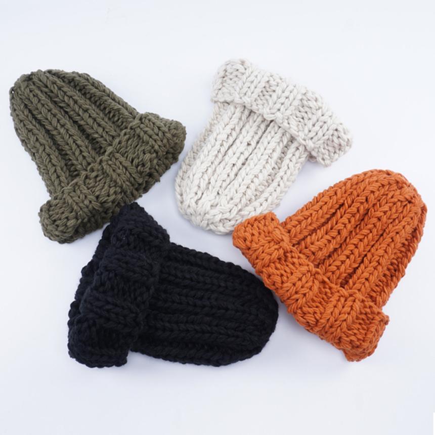 Europe and the United States new knit hat ladies autumn and winter fashion wild thick wool hat solid color simple earmuffs