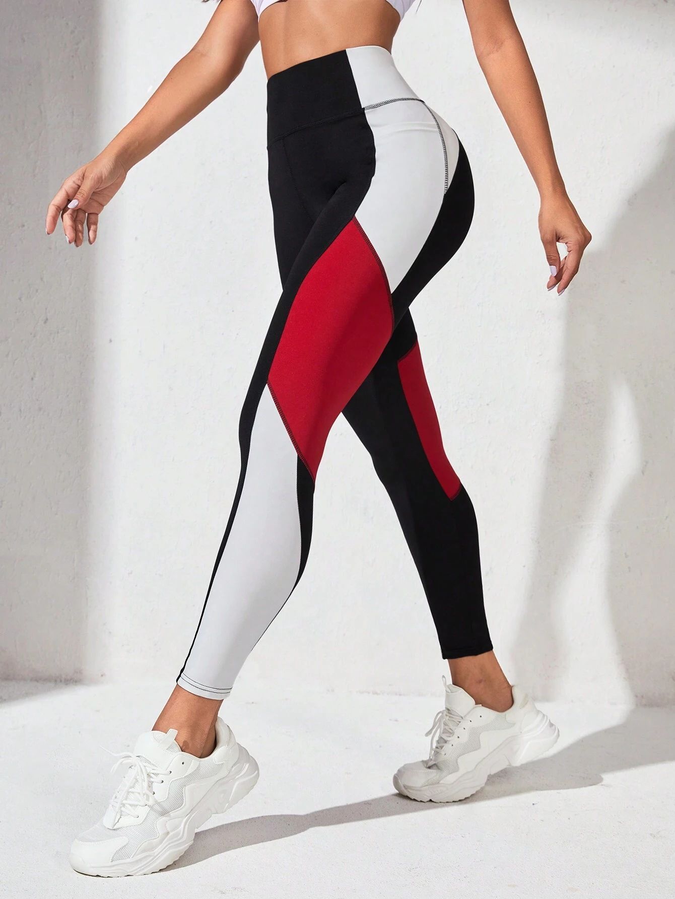 Pantalones de yoga Pantalones para correr con costuras europeas y americanas para mujer